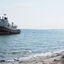  Denmark, 27 Apr 2024  This old tug, the Käthe Wessels, is grounded  and  anchored just off the beach of Amager Strandpark.