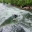  Germany, 15 Apr 2024  Standing wave surfers at Eisbachwelle near old town München.