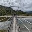  Aotearoa New Zealand, 13 Jan 2024  Crossing the Punakaiki River swing bridge.