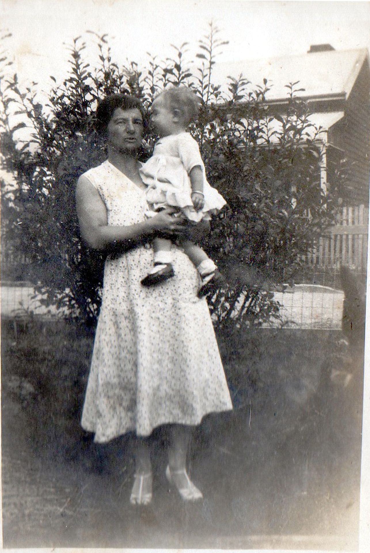  Florence Ada Griffin  (my great aunt Doll) holding my  Aunty Joan .