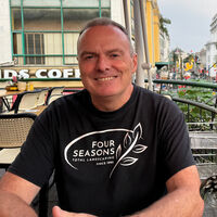 Me in Hanoi in 2024 wearing my Four Seasons Total Landscaping t-shirt.